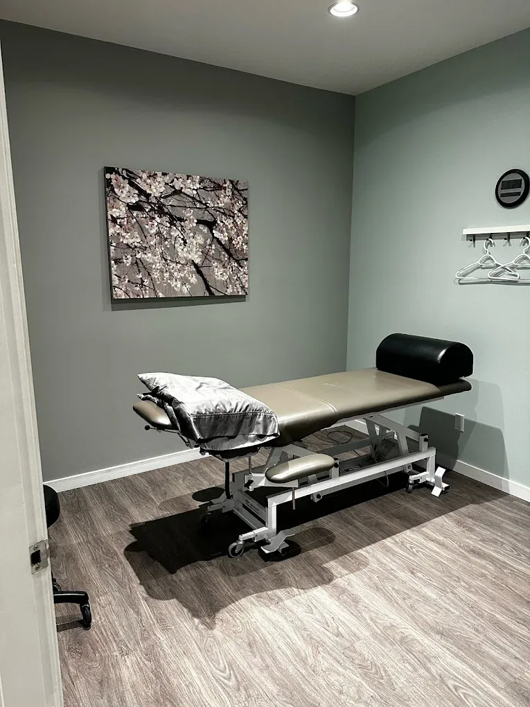 A treatment room at Kinetic Therapy Clinic, with a treatment table set up for an appointment